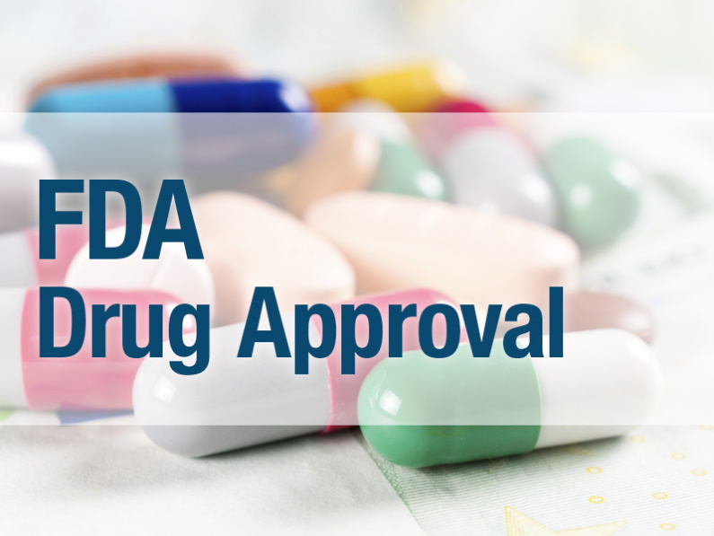 pills scattered with the words FDA drug approval in front