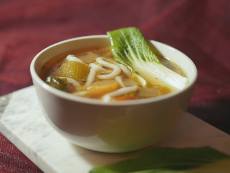 bowl of noodle soup with vegetables